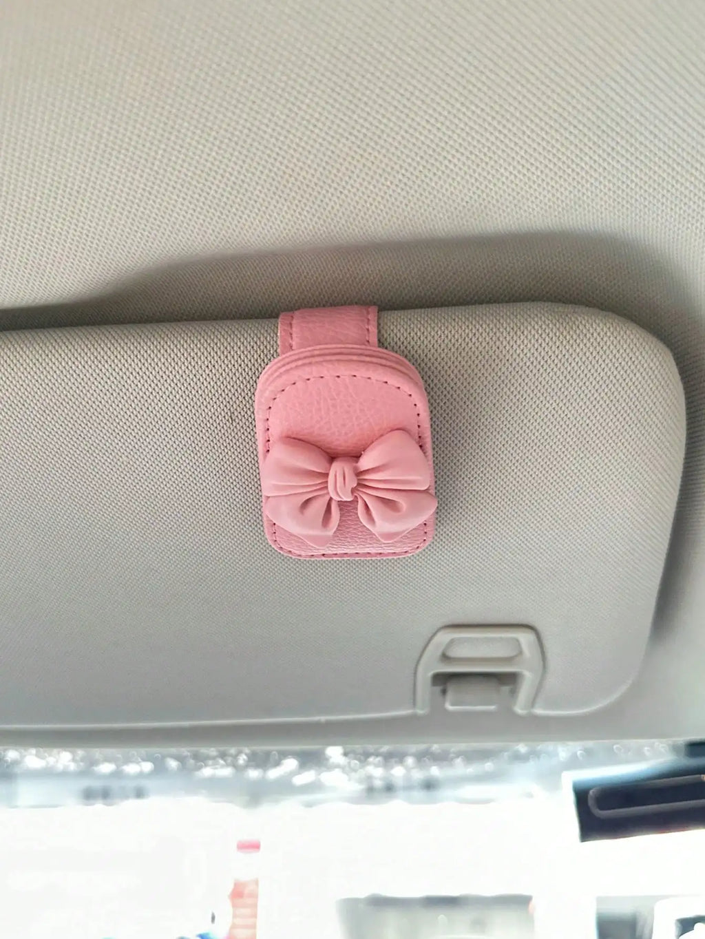Car sun visor, glasses clip, bow tie with rhinestones